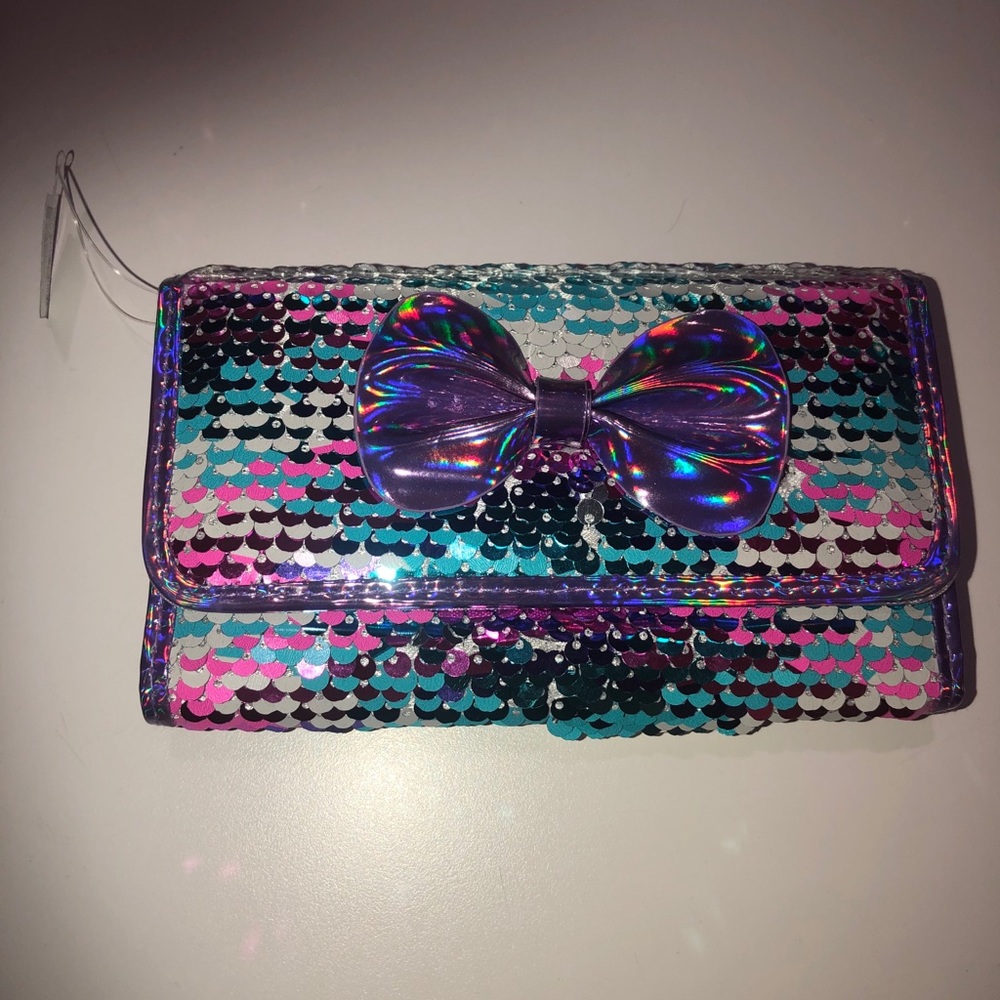Sequin wallet from Claire’s.